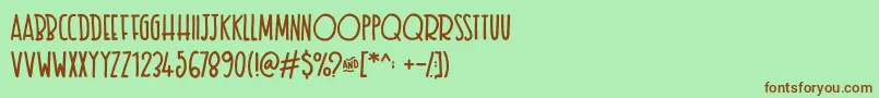 フォントTexastoast – 緑の背景に茶色のフォント