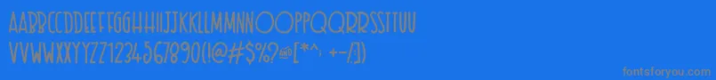 フォントTexastoast – 青い背景に灰色の文字