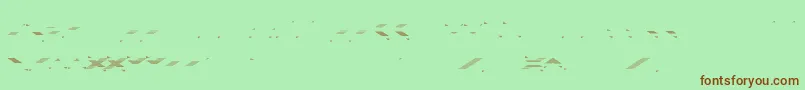 フォントVerminVibesOutOfInk – 緑の背景に茶色のフォント