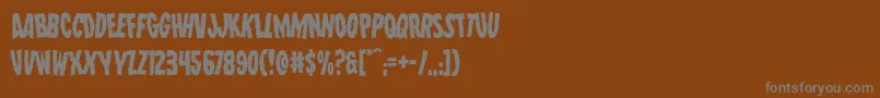 フォントWolfbrotherslean – 茶色の背景に灰色の文字