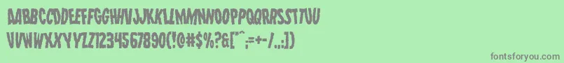 フォントWolfbrotherslean – 緑の背景に灰色の文字