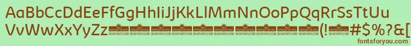 Шрифт KabrioBookTrial – коричневые шрифты на зелёном фоне