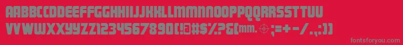 Magnum-fontti – harmaat kirjasimet punaisella taustalla