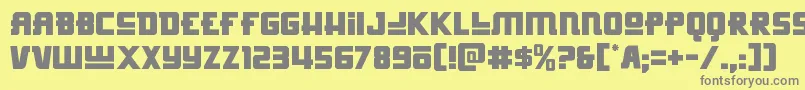 Hongkonghustle-Schriftart – Graue Schriften auf gelbem Hintergrund