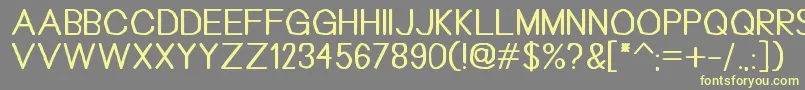 Bouhnti Font – Yellow Fonts on Gray Background