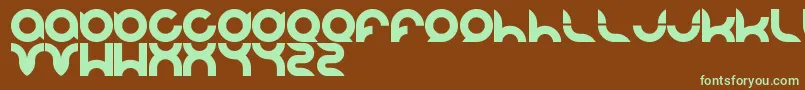 フォントPandaman – 緑色の文字が茶色の背景にあります。