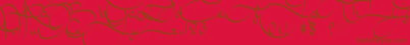 AmalScript-Schriftart – Braune Schriften auf rotem Hintergrund
