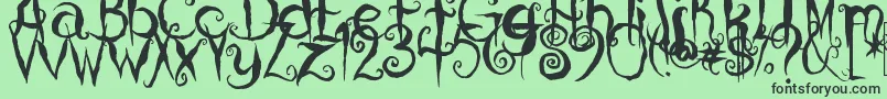 CoralinesCat Font – Black Fonts on Green Background