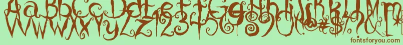 CoralinesCat Font – Brown Fonts on Green Background