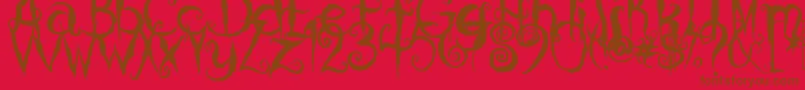 フォントCoralinesCat – 赤い背景に茶色の文字
