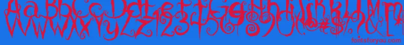 CoralinesCat Font – Red Fonts on Blue Background