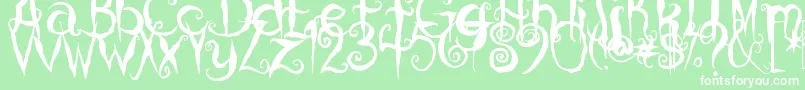 フォントCoralinesCat – 緑の背景に白い文字