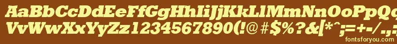 Fonte StaffordserialHeavyItalic – fontes amarelas em um fundo marrom