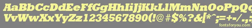Fonte StaffordserialHeavyItalic – fontes amarelas em um fundo cinza