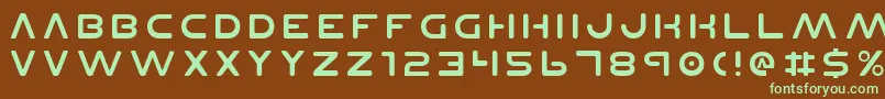 フォントPlanetnv2 – 緑色の文字が茶色の背景にあります。