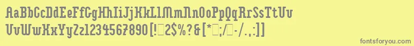 Fonte ImpaktLetPlain.1.0 – fontes cinzas em um fundo amarelo