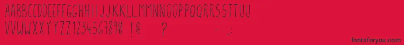 Czcionka Gcmfontone – czarne czcionki na czerwonym tle