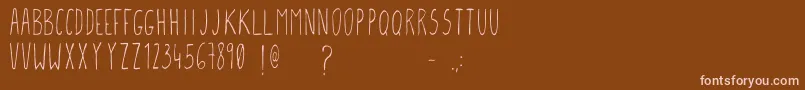 Czcionka Gcmfontone – różowe czcionki na brązowym tle