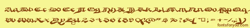 フォントCrappygothic – 茶色の文字が黄色の背景にあります。