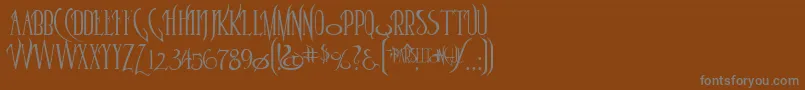 Parselto-Schriftart – Graue Schriften auf braunem Hintergrund