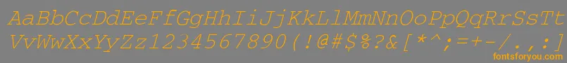フォントCourdli – オレンジの文字は灰色の背景にあります。