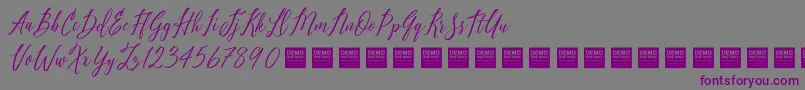 Шрифт PureSeductionDemo – фиолетовые шрифты на сером фоне