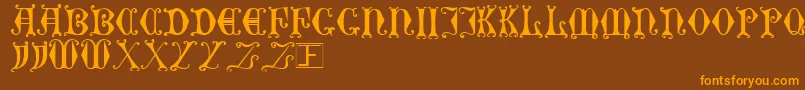 Curlser Font – Orange Fonts on Brown Background