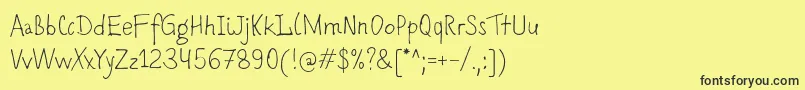 Romochka Font – Black Fonts on Yellow Background