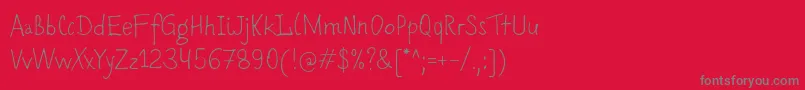 Romochka Font – Gray Fonts on Red Background
