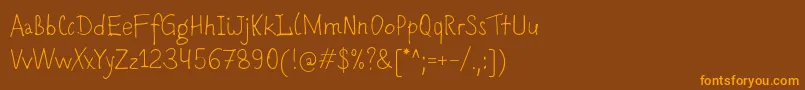 Шрифт Romochka – оранжевые шрифты на коричневом фоне