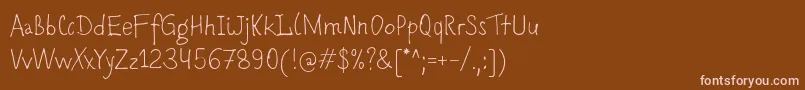 Romochka Font – Pink Fonts on Brown Background