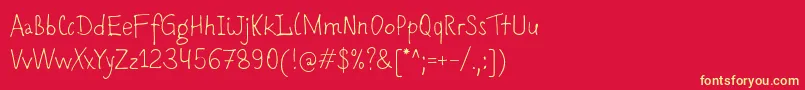 Romochka Font – Yellow Fonts on Red Background