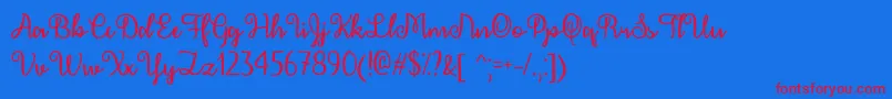 DecemberCalligraphyOtf Font – Red Fonts on Blue Background