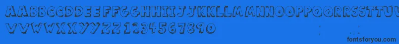 ScoolarTfb-Schriftart – Schwarze Schriften auf blauem Hintergrund