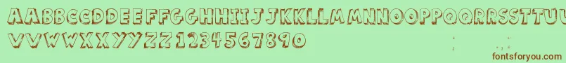 Шрифт ScoolarTfb – коричневые шрифты на зелёном фоне