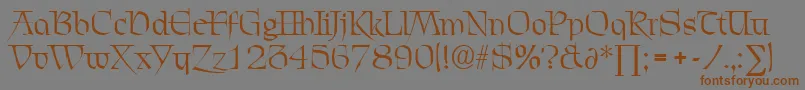 フォントChevalierDb – 茶色の文字が灰色の背景にあります。