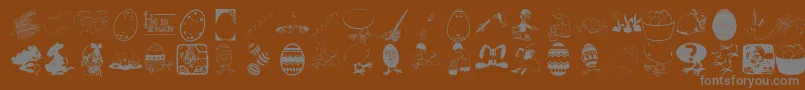 フォントEastereggs – 茶色の背景に灰色の文字