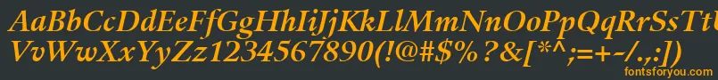 GuardiLt76BoldItalic Font – Orange Fonts on Black Background