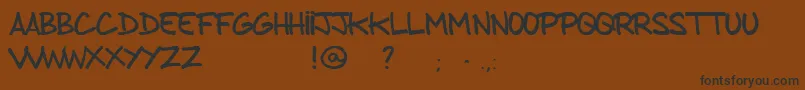 FromBrushToCaps Font – Black Fonts on Brown Background