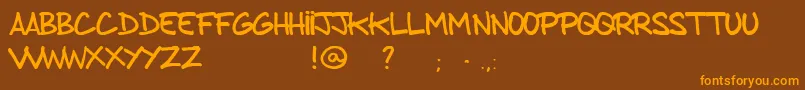FromBrushToCaps-fontti – oranssit fontit ruskealla taustalla