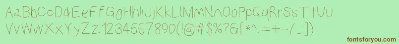 Kabinarg Font – Brown Fonts on Green Background