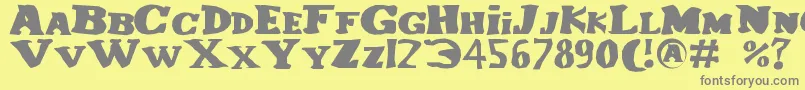 Lecorniaud-fontti – harmaat kirjasimet keltaisella taustalla