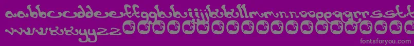 Fonte Earthling. – fontes cinzas em um fundo violeta