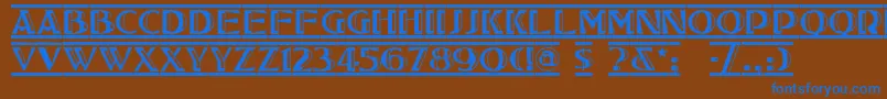 フォントTucsonDeco – 茶色の背景に青い文字