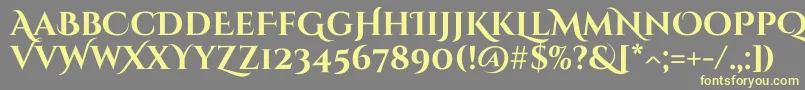 CinzeldecorativeBold-fontti – keltaiset fontit harmaalla taustalla