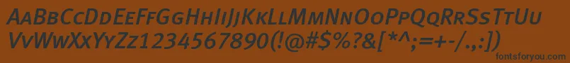 Fonte MetamediumcapslfcItalic – fontes pretas em um fundo marrom
