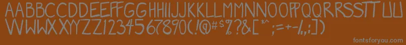 Шрифт MangaSpeak2 – серые шрифты на коричневом фоне