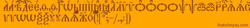 TriodionCapsUcs Font – Brown Fonts on Orange Background