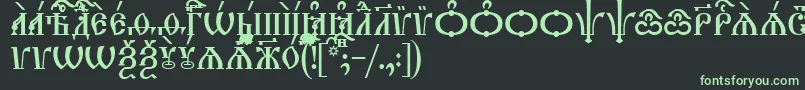 TriodionCapsUcs Font – Green Fonts on Black Background
