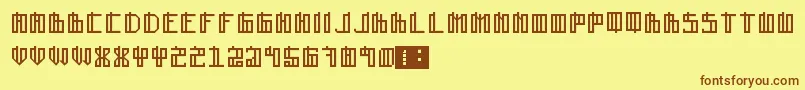 Lain-fontti – ruskeat fontit keltaisella taustalla